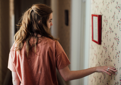 Girl Touching Wall
