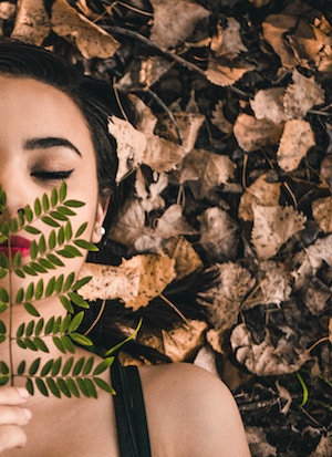 Woman Lying on Leaves