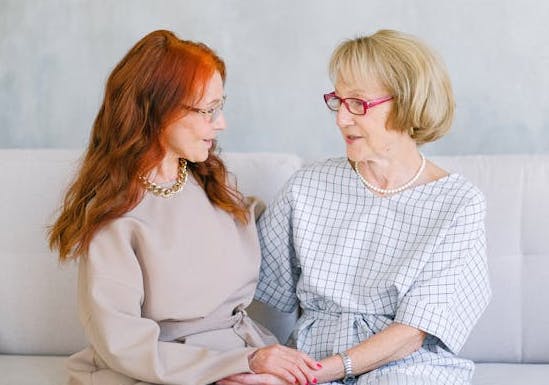 women-two-speaking image